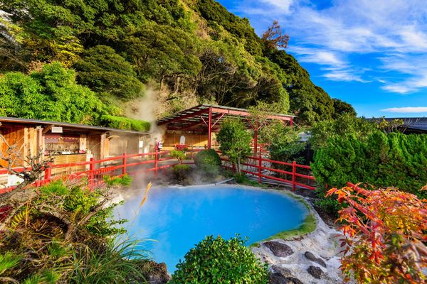 Geothermal water steams from the hot spring in Beppu