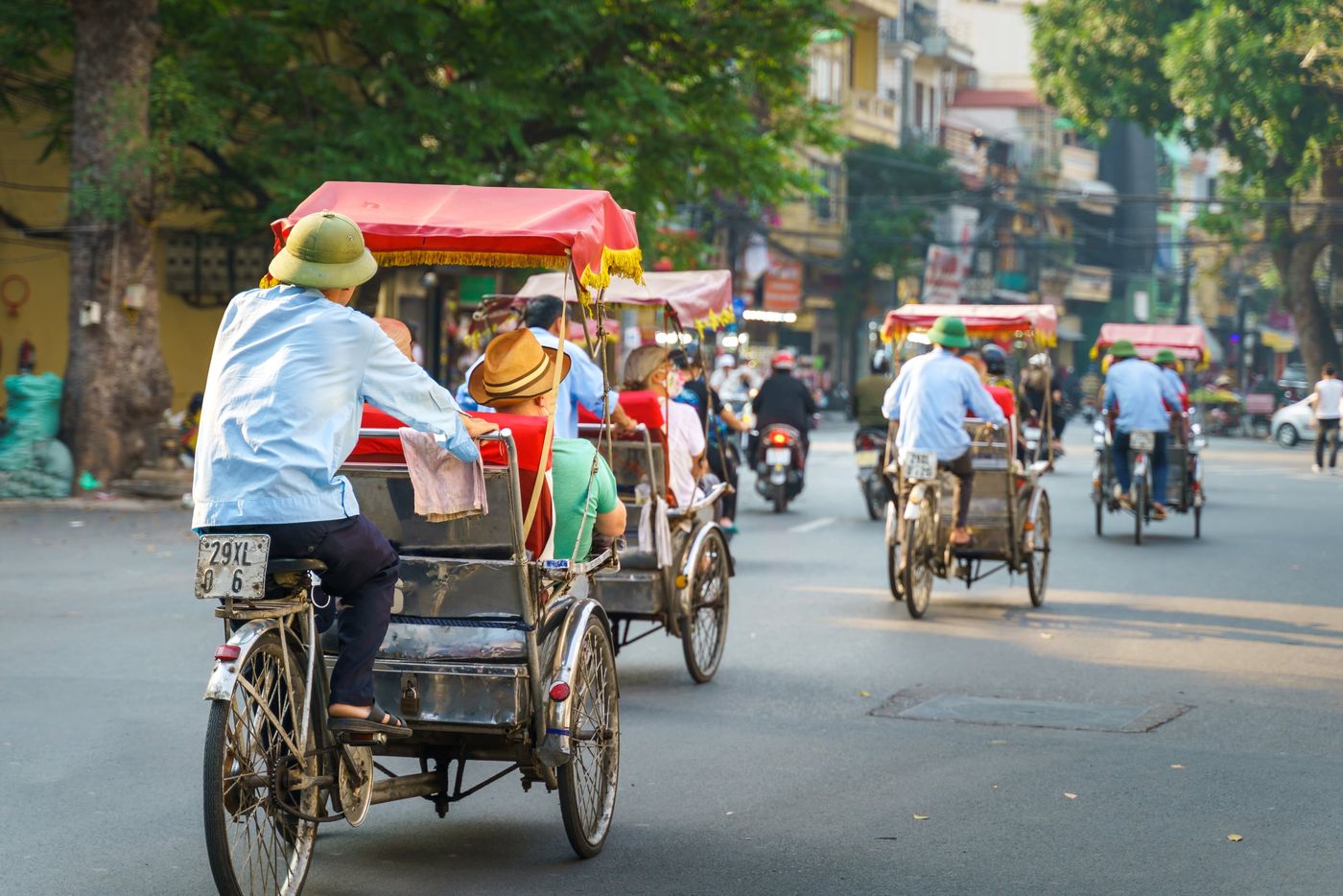 Cyclo,Driver,Taking,Tourist,Visiting,Old,Quarter Hanoi Vietnam