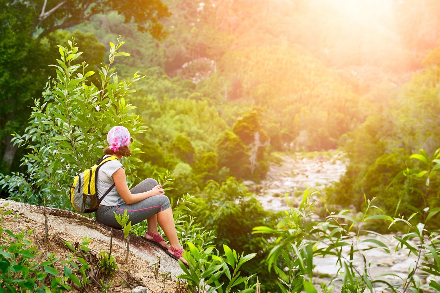 Young,Woman,Tourist,With,Backpack,Relaxing,On,Top,Of,The Moumtain