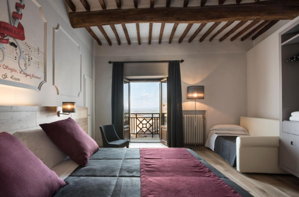 Hotel La Cisterna Bedroom