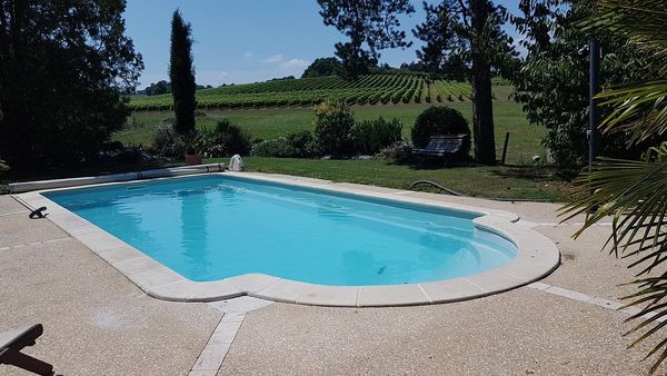 Le Couloumé Pool with view of vineyard