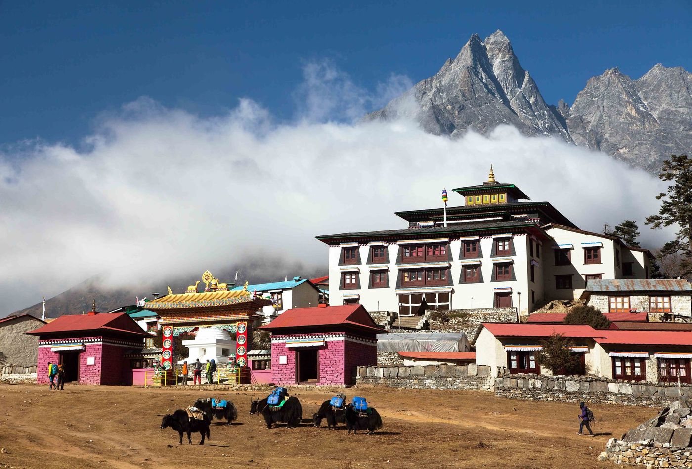 Monastry Nepal and mountains at back lower Nepal mountains