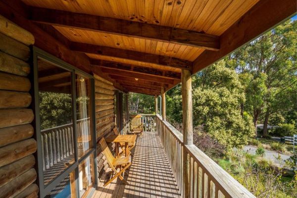 Stewarts Bay Lodge Log Cabin balcony