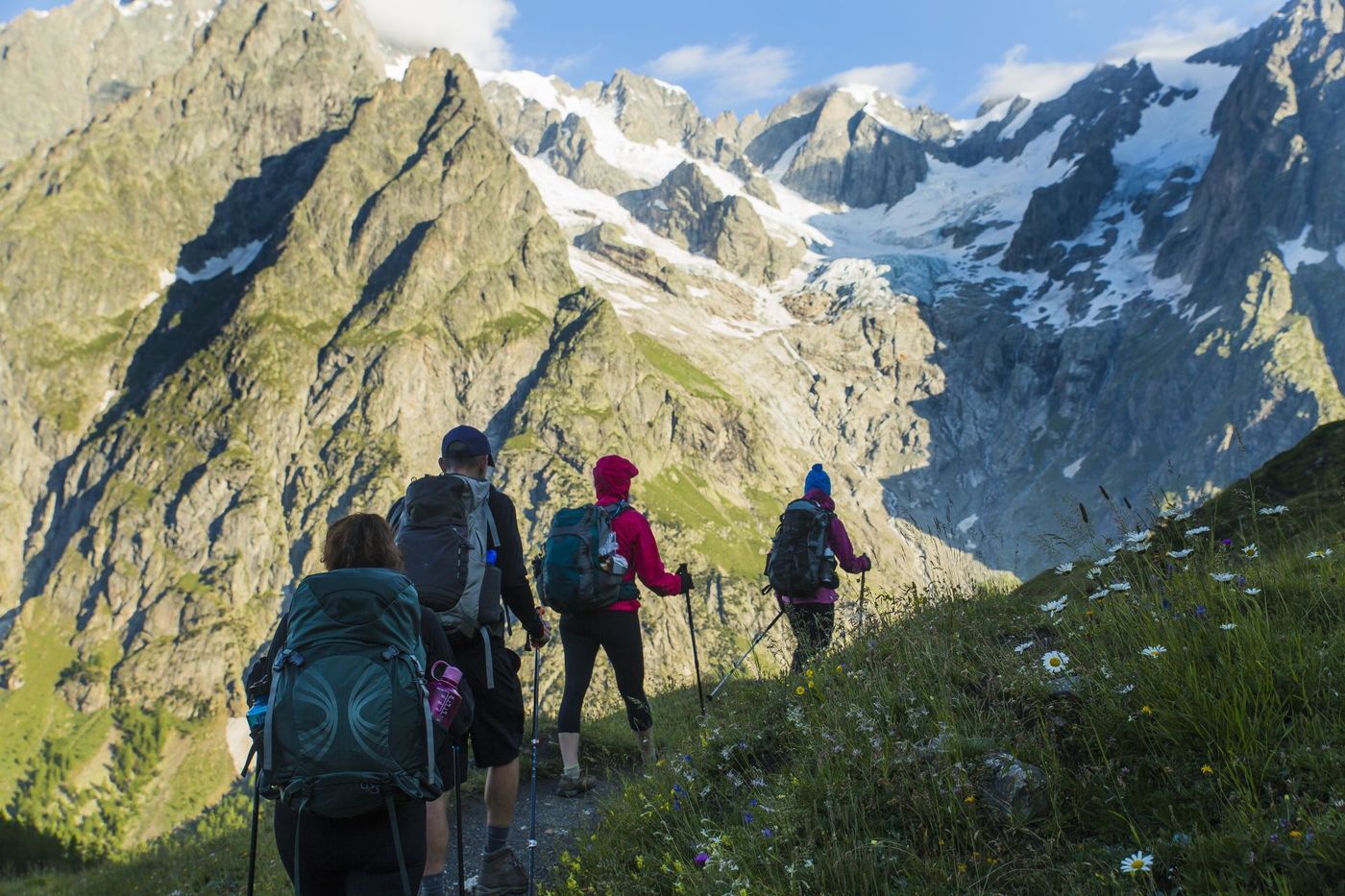 Trekkers-Ascending-Alpine-Heights-near-the-Refuge-Walter-Bonatti-Mont