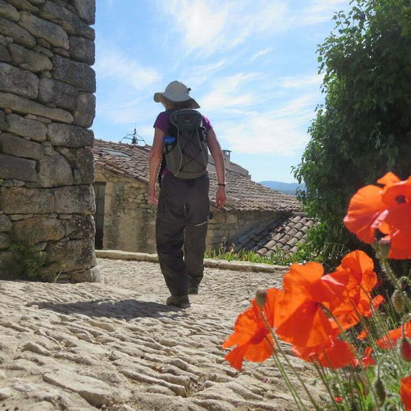 Walker on cobble road in Provence